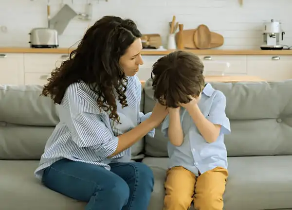 frustrated parent comforting her child (1)